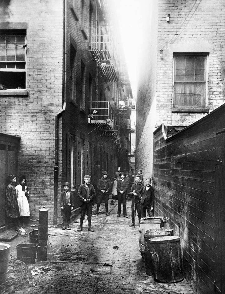 Photo:  Children in Mullens Alley off Cherry Street, New York City, 1888, by Jacob Riis